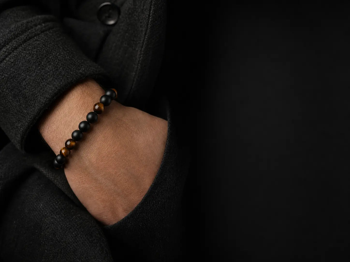 Natural stone bracelet worn on a wrist